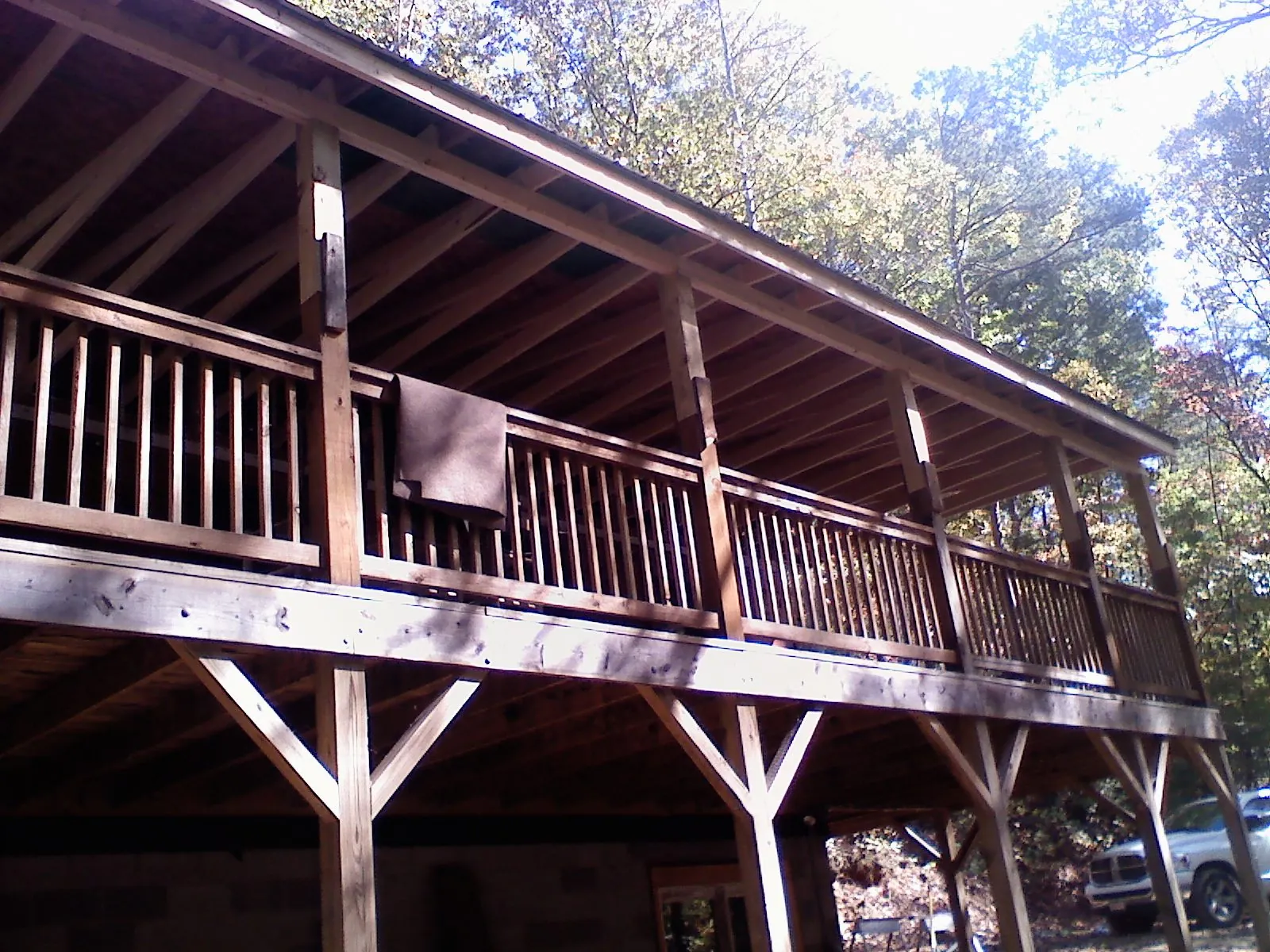 Timber framing under a new elevated porch and deck — Roof Leak Repair in Kennebunkport by Roofing Brothers